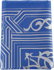 Travel prayer mat in use outdoors