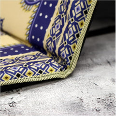 Corded edge and fold detail of the prayer mat