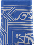 Travel prayer mat in use outdoors