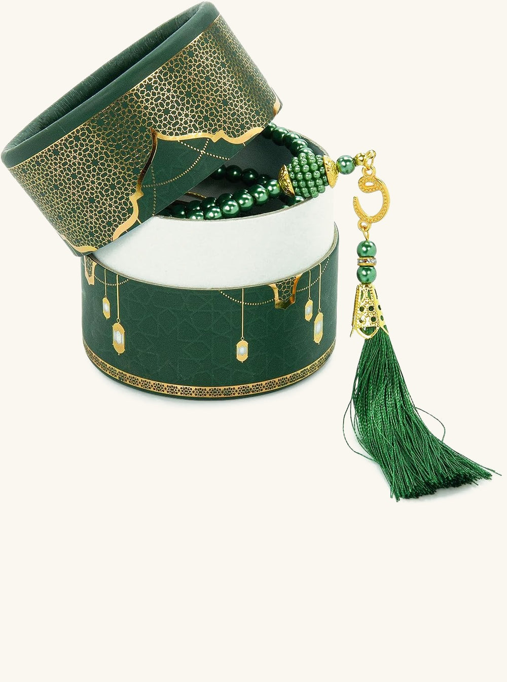 Open green gift box with lid tilted, showing green pearl tasbih with gold tassel inside